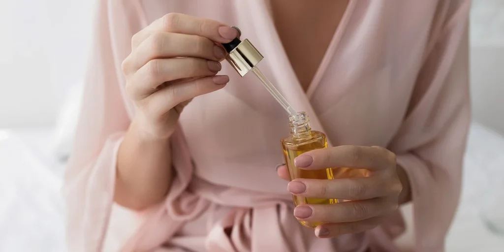 serum bottle in women's hands